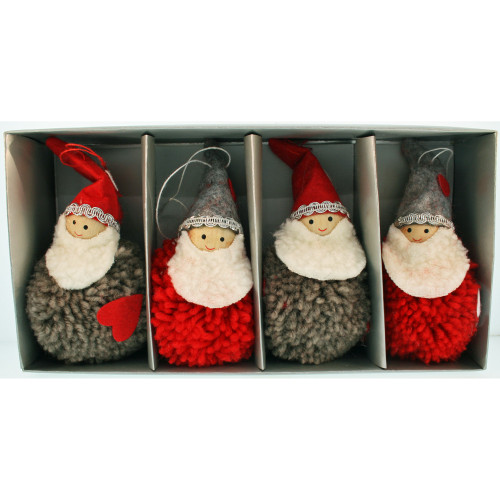 Four red and grey yarn Santa ornaments with white beards in a box.