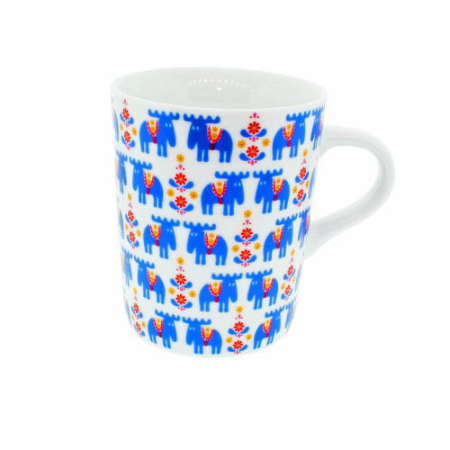 White ceramic mug with blue moose pattern, red and yellow floral accents, and a white handle.