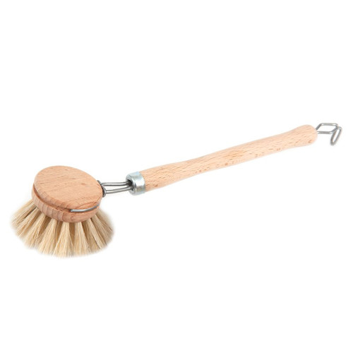 Angled view of an Iris Hantverk wooden dishbrush with natural bristles and a hanging loop.