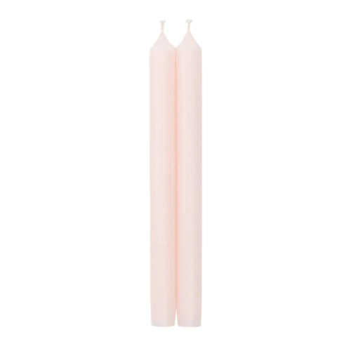 Two 10-inch petal pink taper candles standing upright against a white background.