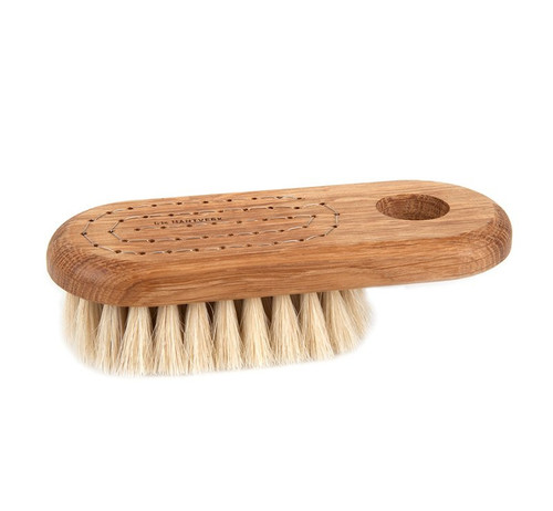 An oil-treated oak and horsehair bath brush, viewed from a side angle, showing its wooden handle and soft bristles.