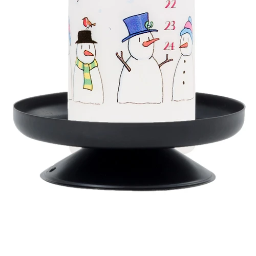 A black metal pillar candle holder with a snowman advent candle.
