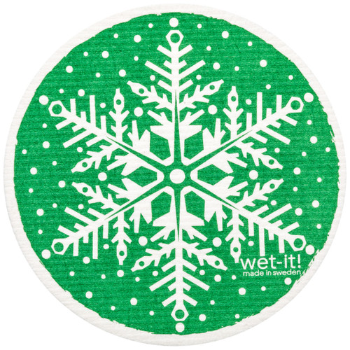 Round green Swedish dishcloth with white snowflake design and "wet-it!" logo.