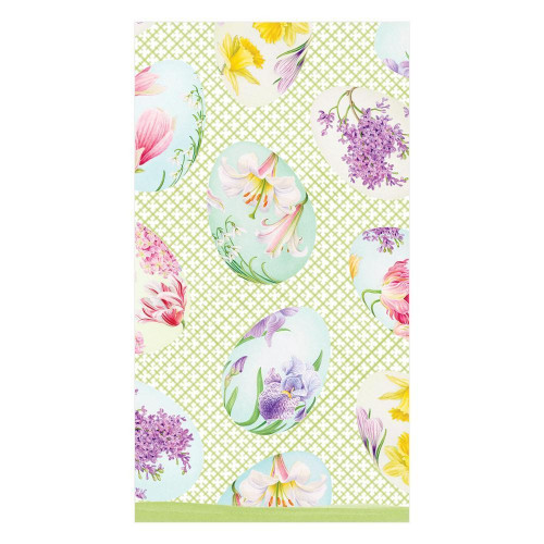 Easter guest towels with floral decorated eggs on a green lattice background.