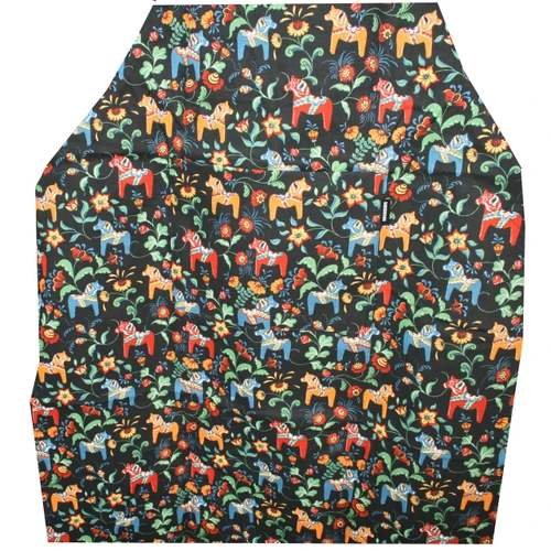 Black Arvidssons apron with a colorful Swedish Dalahorse floral pattern.