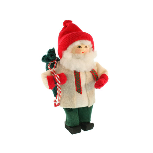 Swedish Tomte Santa figurine with red hat, white beard, green sack, and woolen clothes.