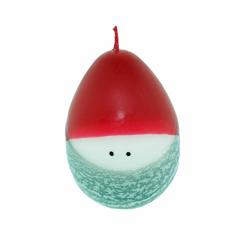 Red, white, and green Tomte candle styled like a plump gnome with two black eyes and a red wick on top.