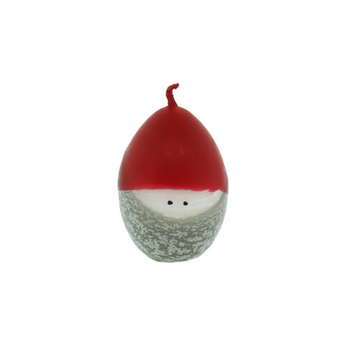 Red-capped tomte candle with a textured grey beard and two black dots for eyes.