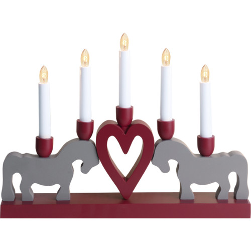 A red wooden Scandinavian candelabra with a central heart, two grey horses, and five glowing electric candles.