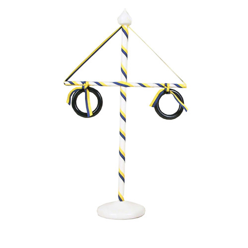 White wooden Midsummer pole with blue and yellow ribbon details, black rings, and a white base.