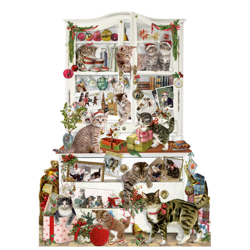 Advent calendar featuring a white cabinet filled with playful cats and Christmas decorations.