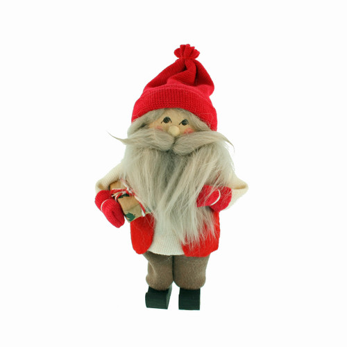 Handcrafted 6-inch Scandinavian tomte doll in a red knit hat, white sweater, and red vest holding a small gift.