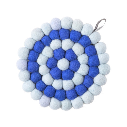 Round wool felt trivet in concentric circles of light blue and royal blue, seen from above.