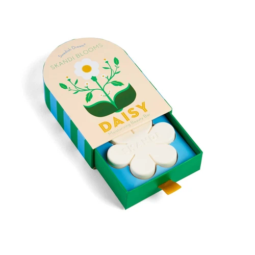 Swedish Dream Skandi Daisy soap bar shaped like a white flower in a sliding green box.