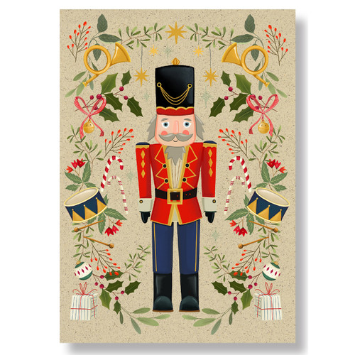 Nutcracker card with soldier, drums, candy canes, and gold horns on beige.