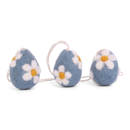 Three blue felt Easter egg ornaments with white daisy details, strung together.