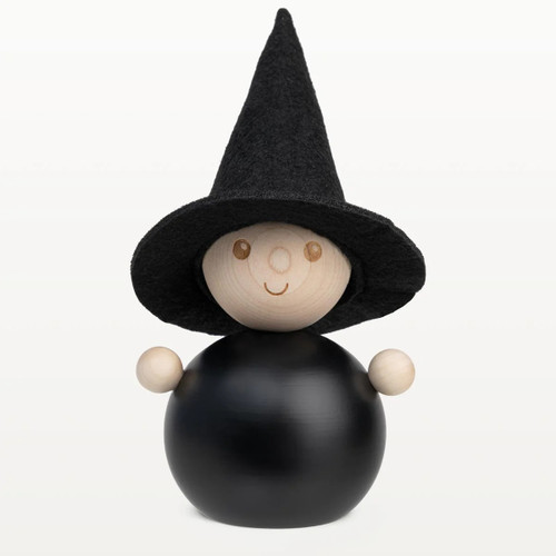 Wooden witch figurine with black hat, black body, and wooden arms.