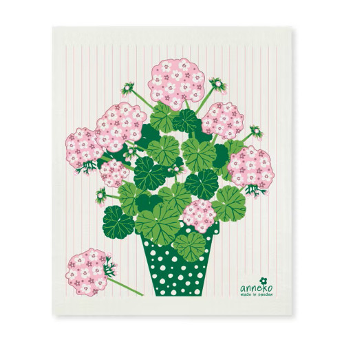 Geranium print Swedish dishcloth. Pink flowers, green leaves, green polka dot pot, on a white background.