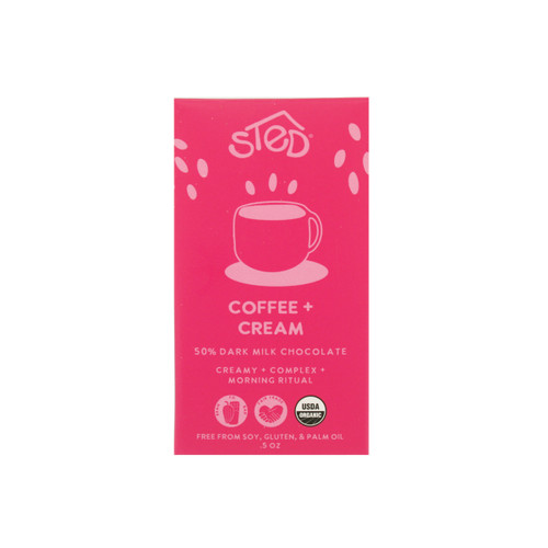 Pink Sted Coffee & Cream chocolate bar. Features a coffee cup graphic, USDA organic seal.