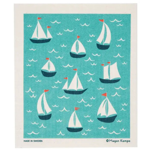 Blue and white sailboat pattern on a teal background; "Made in Sweden" and "Megan Kampa" printed.