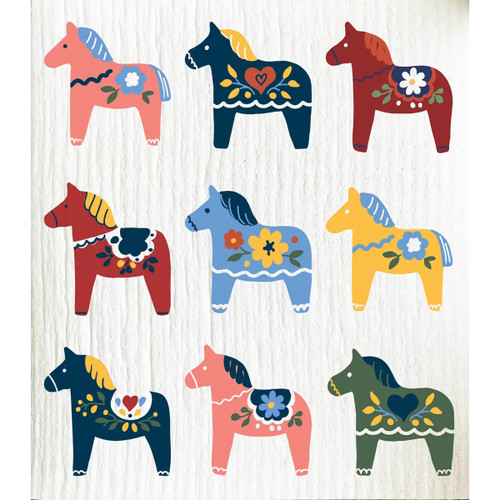 Nine colorful Swedish Dala horses with floral patterns on a white textured background.