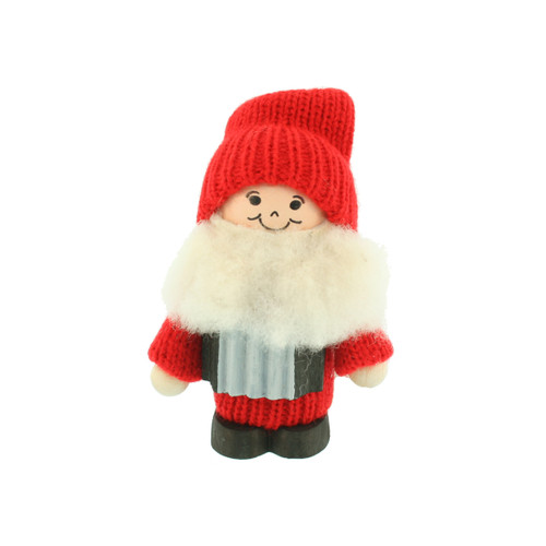 A 3.5-inch Ljungstroms wooden tomte Santa figurine wearing a red knitted hat and carrying a silver accordion, on a white
