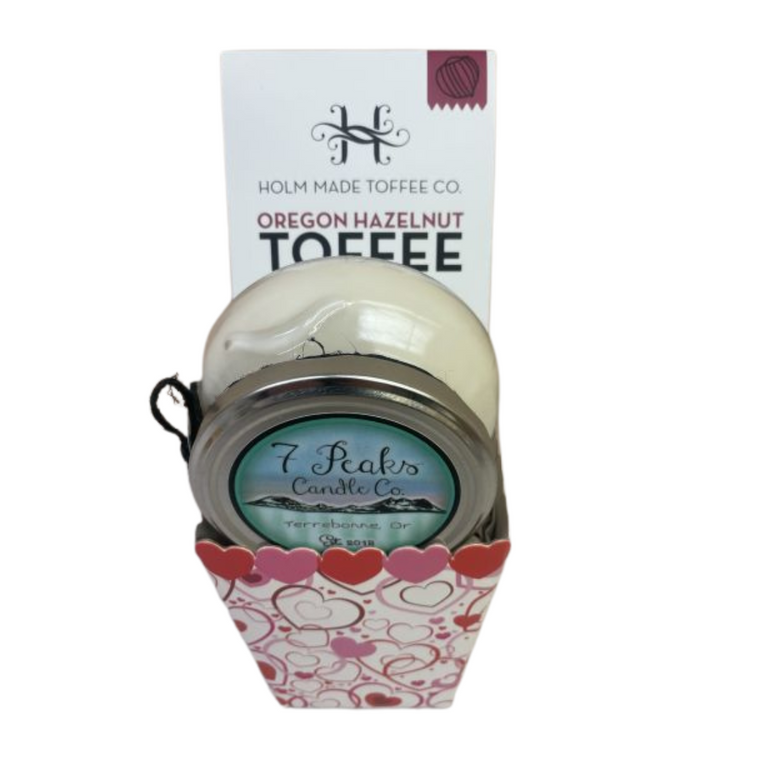 Oregon Romance includes Holm Made Toffee Co. White Chocolate Raspberry Toffee, 7 Peaks Candle Co. -  Raspberry Vanilla Candle - notes of raspberry, blackberry and vanilla (made locally and burns 25-30 hours)