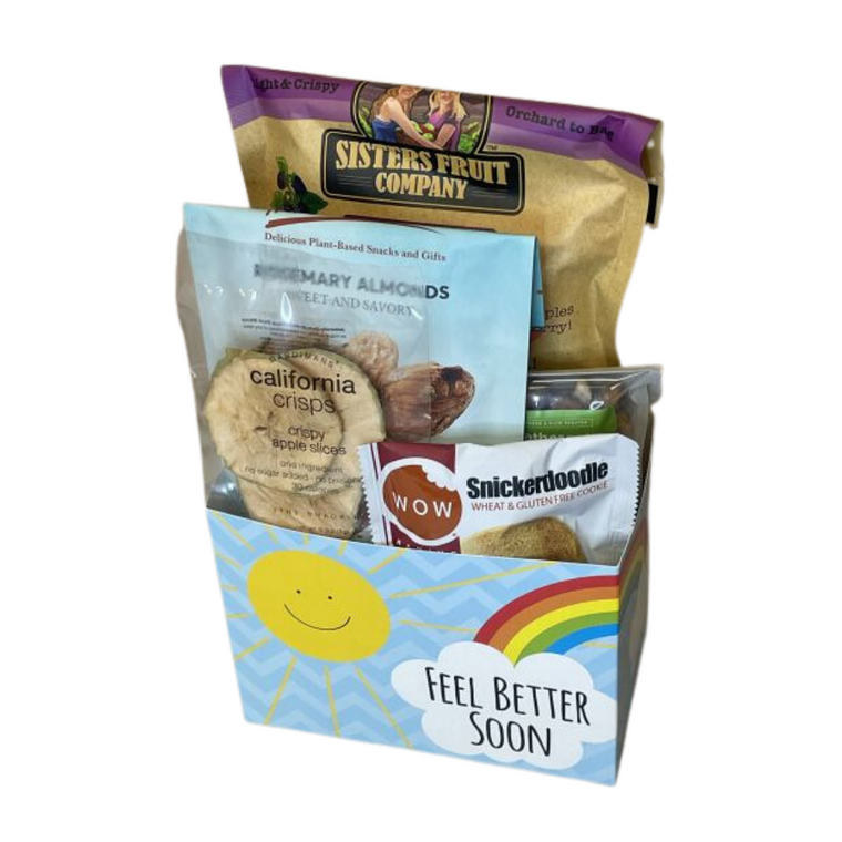 GF Get Well Soon includes Sisters Fruit Company apple chips, rosemary almonds, Worthy Cashews, apple slices, GF snicker doodle cookie.  Designed in a Get Well Soon gift box with handmade bow.