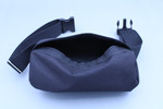 Half face respirator bag made from heavy duty polyester attaches with a heavy duty quick release clip at the waist.