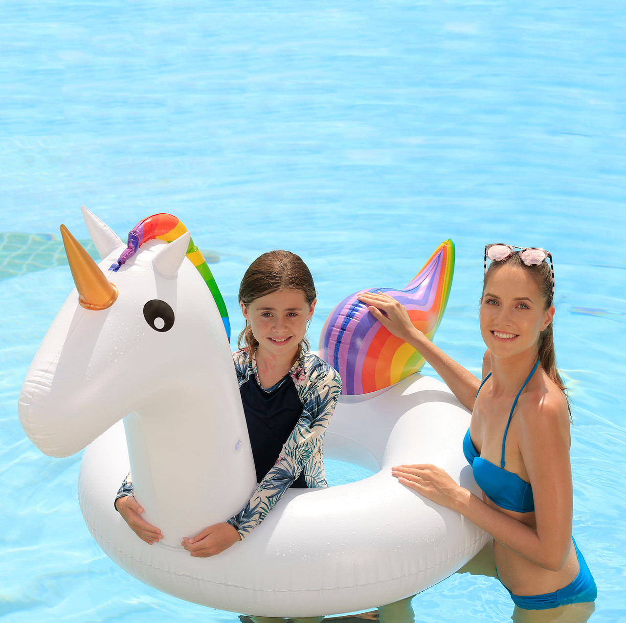 Inflatable Donut Ring in Swimming Pool · Free Stock Photo