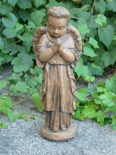 25" Decorative Standing on Saddle Stone Boy Angel Statue - Moss