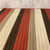 1.6' x 2.5' Red and Ivory Striped Handcrafted Reversible Rectangular Area Throw Rug Runner