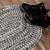 4' x 7' Black and White Handcrafted Oval Outdoor Area Throw Rug