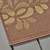 5.25' x 7.5' Brown and Orange Floral Rectangular Outdoor Area Throw Rug