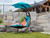 84" Blue Outdoor Lounge Chair with an Overhanging Umbrella