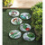 10.75" White and Green "Love Blooms Here" Outdoor Garden Stepping Stone