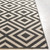 7.25' x 10.5' Black and White Geometric Machine Woven Rectangular Outdoor Area Throw Rug