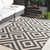 5.75' x 8.75' Black and White Geometric Machine Woven Rectangular Outdoor Area Throw Rug