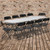 96" Granite White and Black Contemporary Bi-Fold Training Folding Table with Folding Chairs