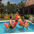 Set of 2 Inflatable Hot Dog Ride On Swimming Pool Battle Set with Boppers Game - 56"