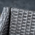 6-Piece Gray Finish Rectangular Wicker Outdoor Furniture Patio Dining Set - Silver Cushions