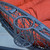 78" Red and Black Cushioned Rattan Wicker Hanging Chair with Stand