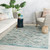 5.25' x 7.5' Blue and White Tribal Sax Rectangular Outdoor Area Throw Rug