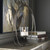 21" Bronze Floating Candle Holder with a Cream Candle
