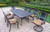 9 Piece Black Aluminum Outdoor Furniture Patio Dining Set with Tan Cushions 84"