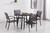 5 Piece Black Round Faux Eco-Wood Outdoor Patio Dining Set with Stackable Arm Chairs
