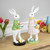 Rabbit Holding Easter Egg Outdoor Garden Statue - 11.5" - White