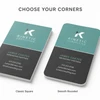 Comparison of teal premium business cards with classic square corners and smooth rounded corners