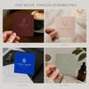 Square business cards displayed for hospitality, events, creative, and wellness brands