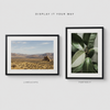 Landscape and portrait photo prints with white matting and modern black frames